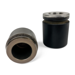 phenolic piston made by KOK International, oe phenolic piston vs metal piston, phenolic brake piston material, plastic engine pistons