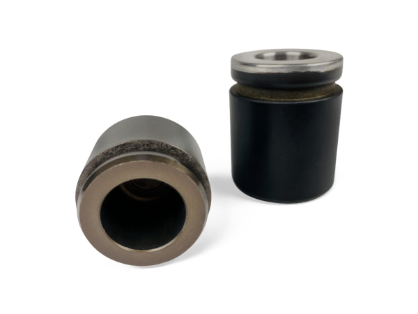 phenolic piston made by KOK International, oe phenolic piston vs metal piston, phenolic brake piston material, plastic engine pistons