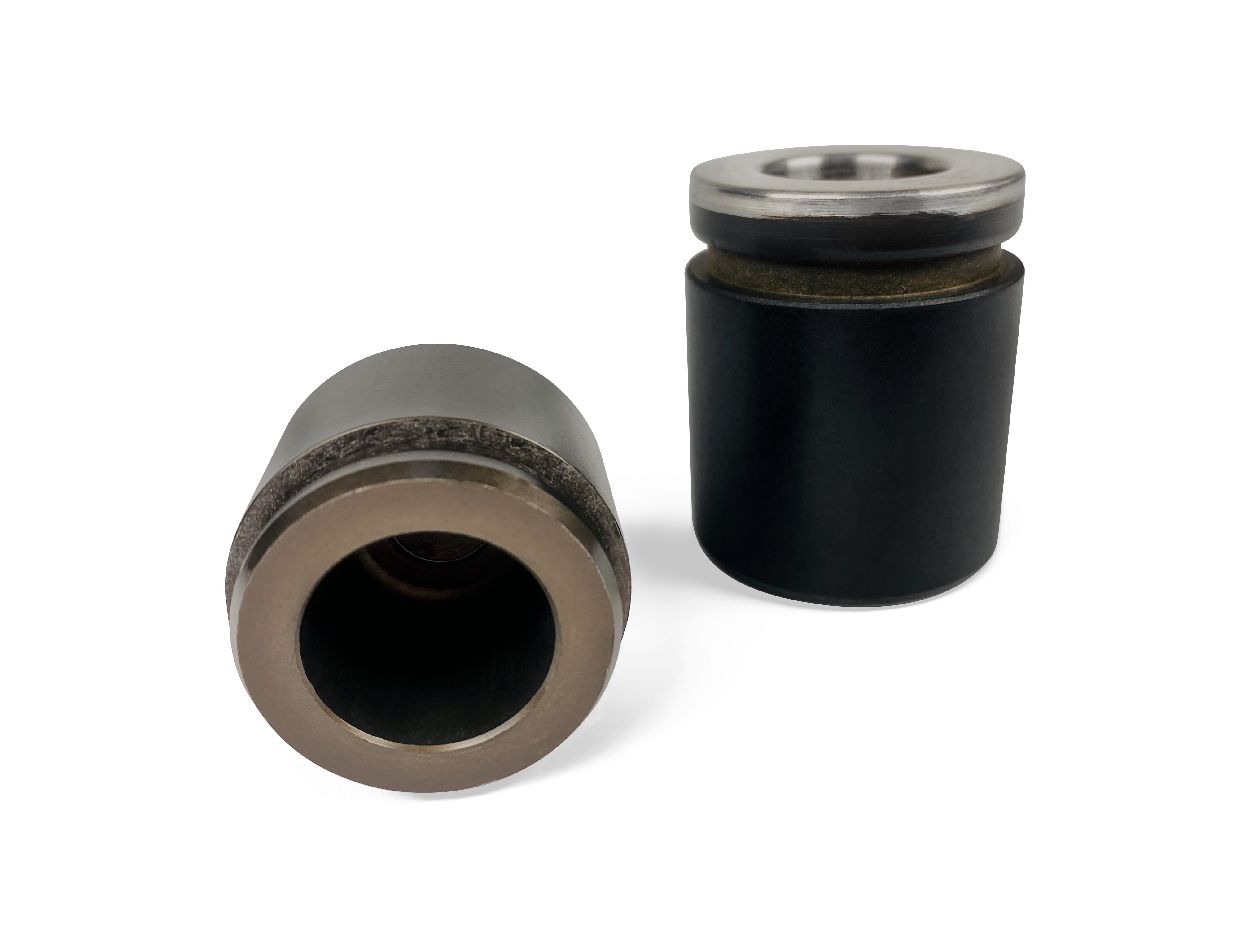 phenolic piston made by KOK International, oe phenolic piston vs metal piston, phenolic brake piston material, plastic engine pistons