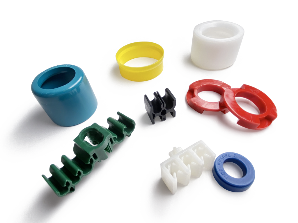 custom injection molded parts made by KOK International, plastic parts manufacturing, automotive plastic component manufacturers, automotive plastic injection molding companies, automotive plastic part design